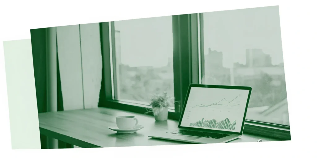 High-yield investment growth chart on a laptop.